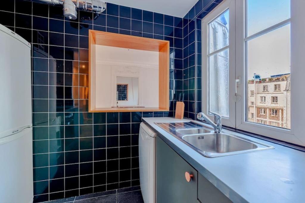 Charmant Appartement Au Coeur De Paris Exterior foto